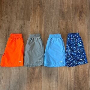 FOUR pairs Nike Dri-Fit training shorts